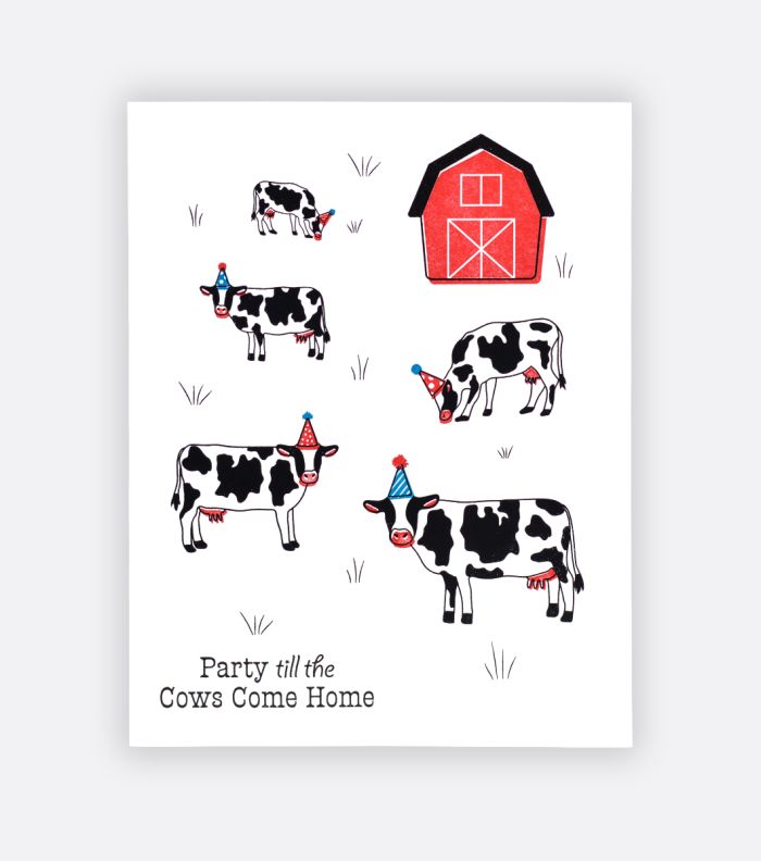 party cows letterpress greeting card on a light gray background card features cows grazing in a field with a barn in the background and a message that says "party till the cows come home"